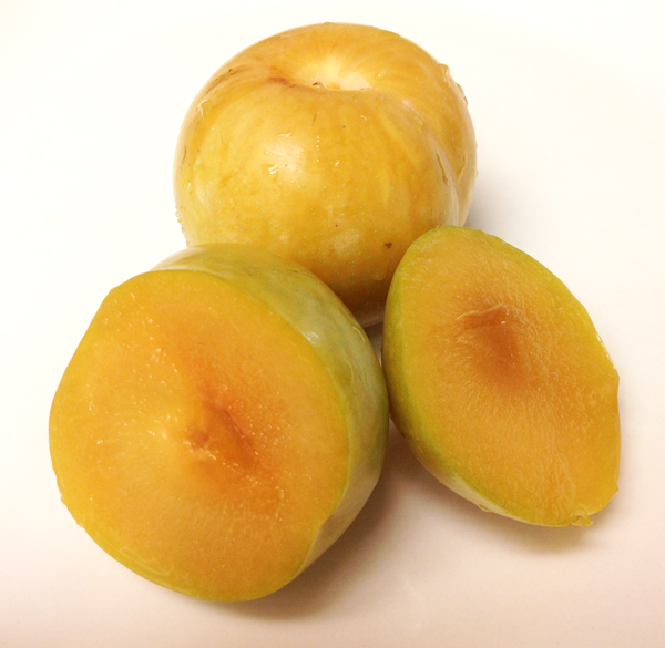 Fresh sliced yellow plums